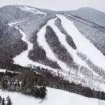 An aerial view of a ski slope in New Hampshire covered in snow.